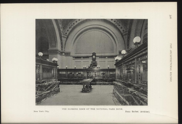 Schwarzes und weißes Foto des Bankettsaals der National Park Bank in New York City, mit Tischen, Lampen, einer Uhr an der Wand und Text unten.