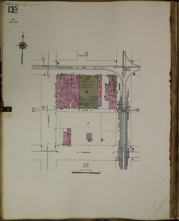 Ein aufgeschlagenes Buch mit einer detaillierten Stadtzeichnung.