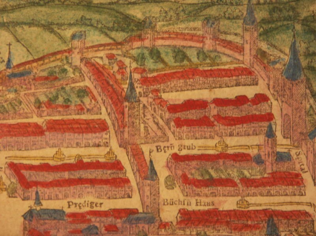 Detailierte alte Karte von Hamburg, Deutschland, zeigt Straßen, Gebäude, Bäume und Text mit Informationen zur Bevölkerung, Geschichte und Kultur.