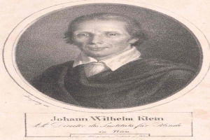 Schwarz-weißes Porträt von Johann Wilhelm Klein, Direktor des Instituts für Blinde in Wien, der einen weißen Hemdkragen trägt und ernst schaut, mit deutschem Text unten.